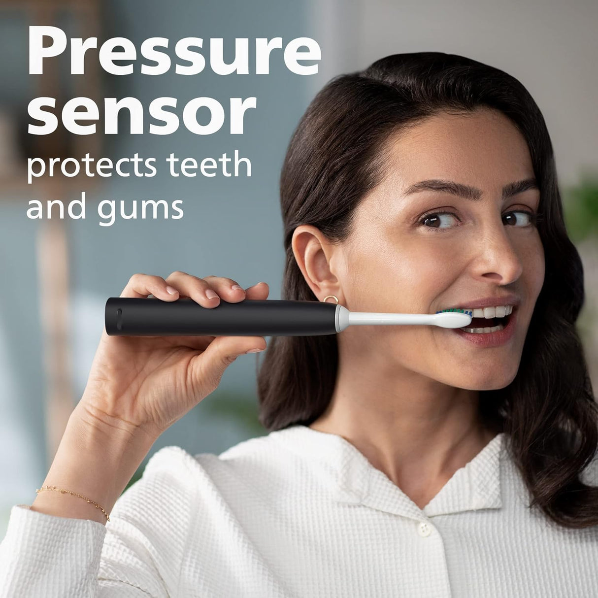 Philips Sonicare 4100 Rechargeable Electric Toothbrush, with Pressure Sensor, 2 Intensity Settings, Smartimer and Quadpacer, 14-Day Battery Life, Black, Model HX3681/24
