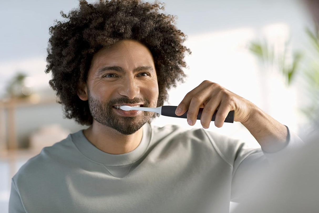 Philips Sonicare 4100 Rechargeable Electric Toothbrush, with Pressure Sensor, 2 Intensity Settings, Smartimer and Quadpacer, 14-Day Battery Life, Black, Model HX3681/24